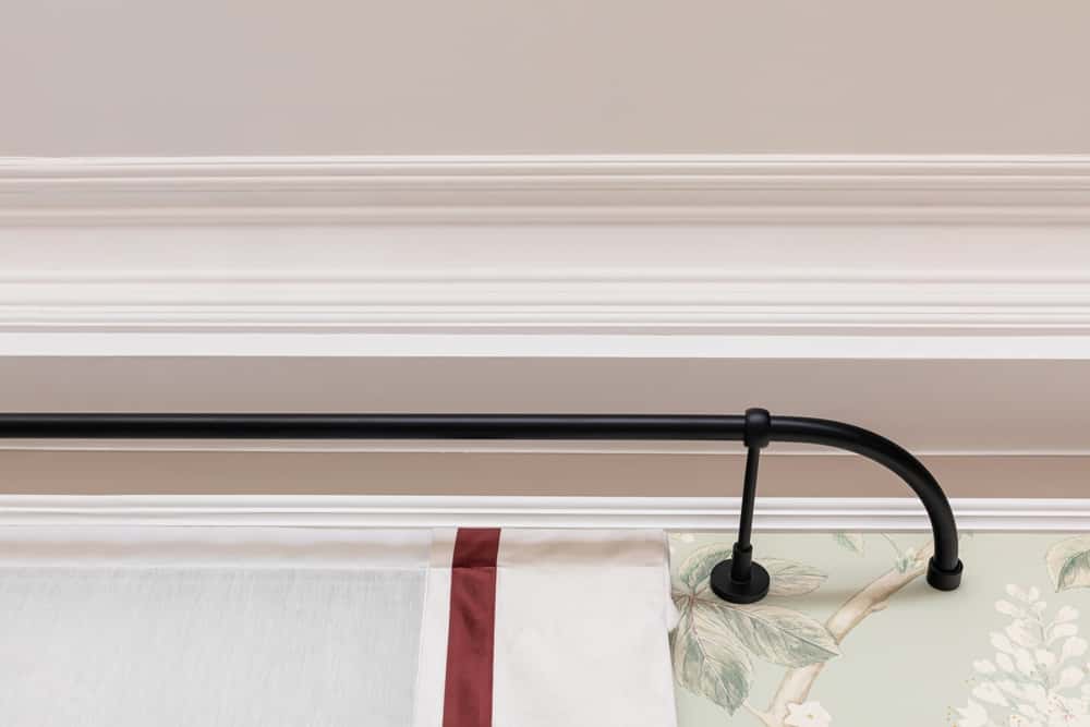 swing arm curtain rods