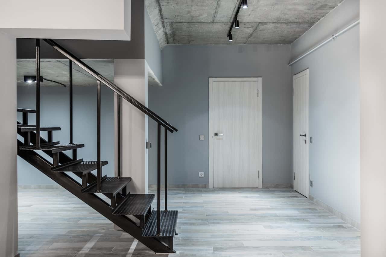Minimalist flush door designs in white for modern industrial home interiors
