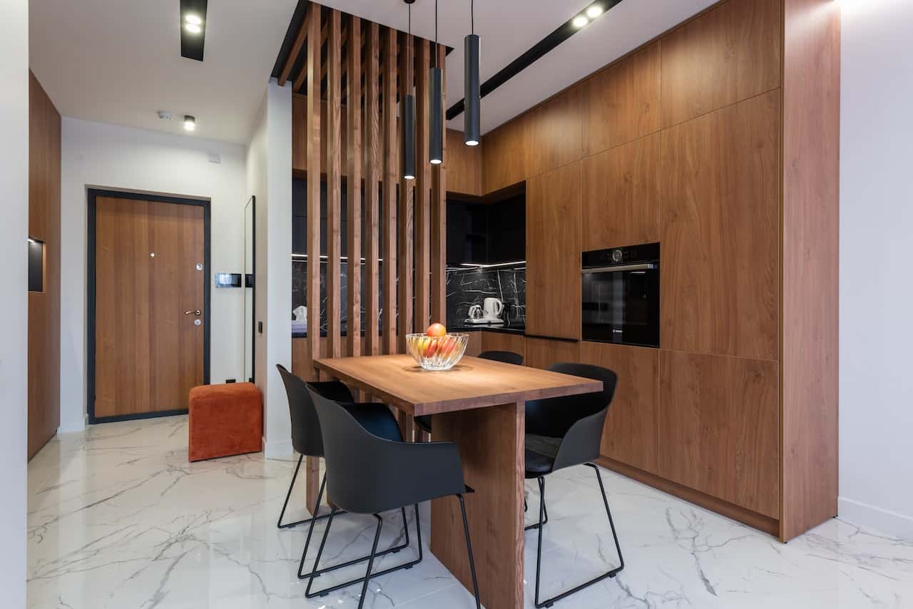 Elegant flush door designs with modern wooden finish in stylish dining space