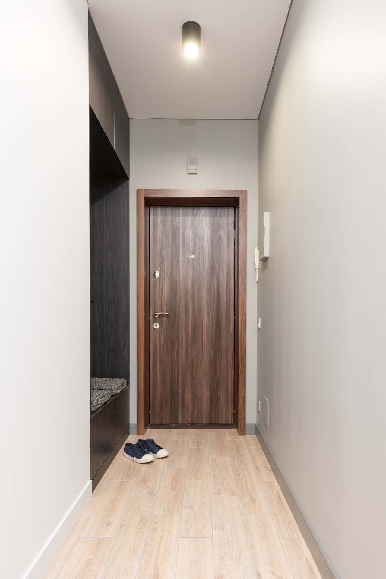 Elegant flush door designs in wood finish for modern home interiors and entryways