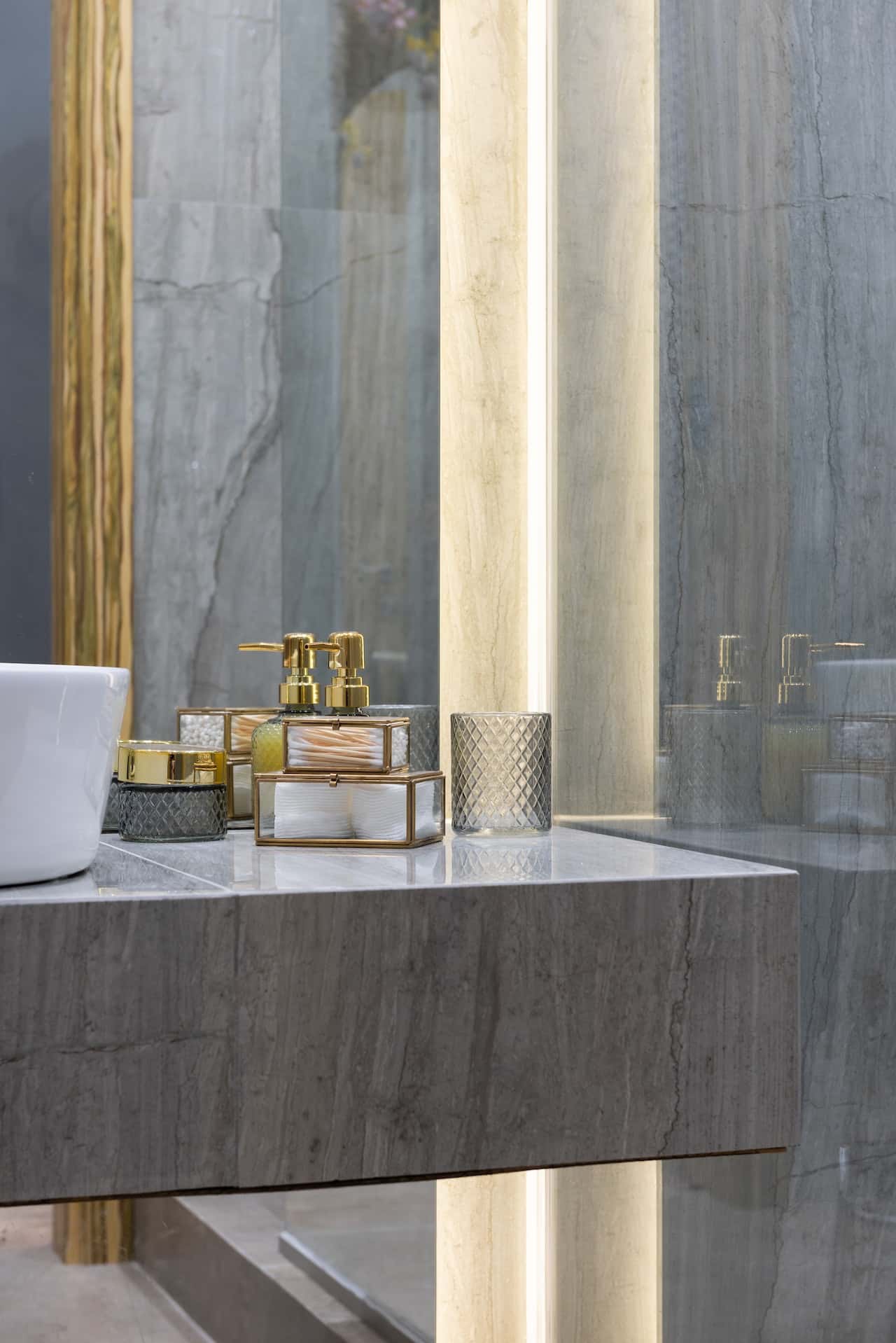 warm yellow backlit bathroom mirror