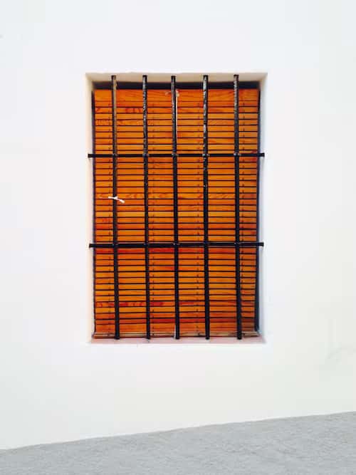 window with colourful drape