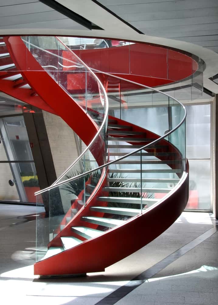 Luxury glass railing design for stairs with red spiral style