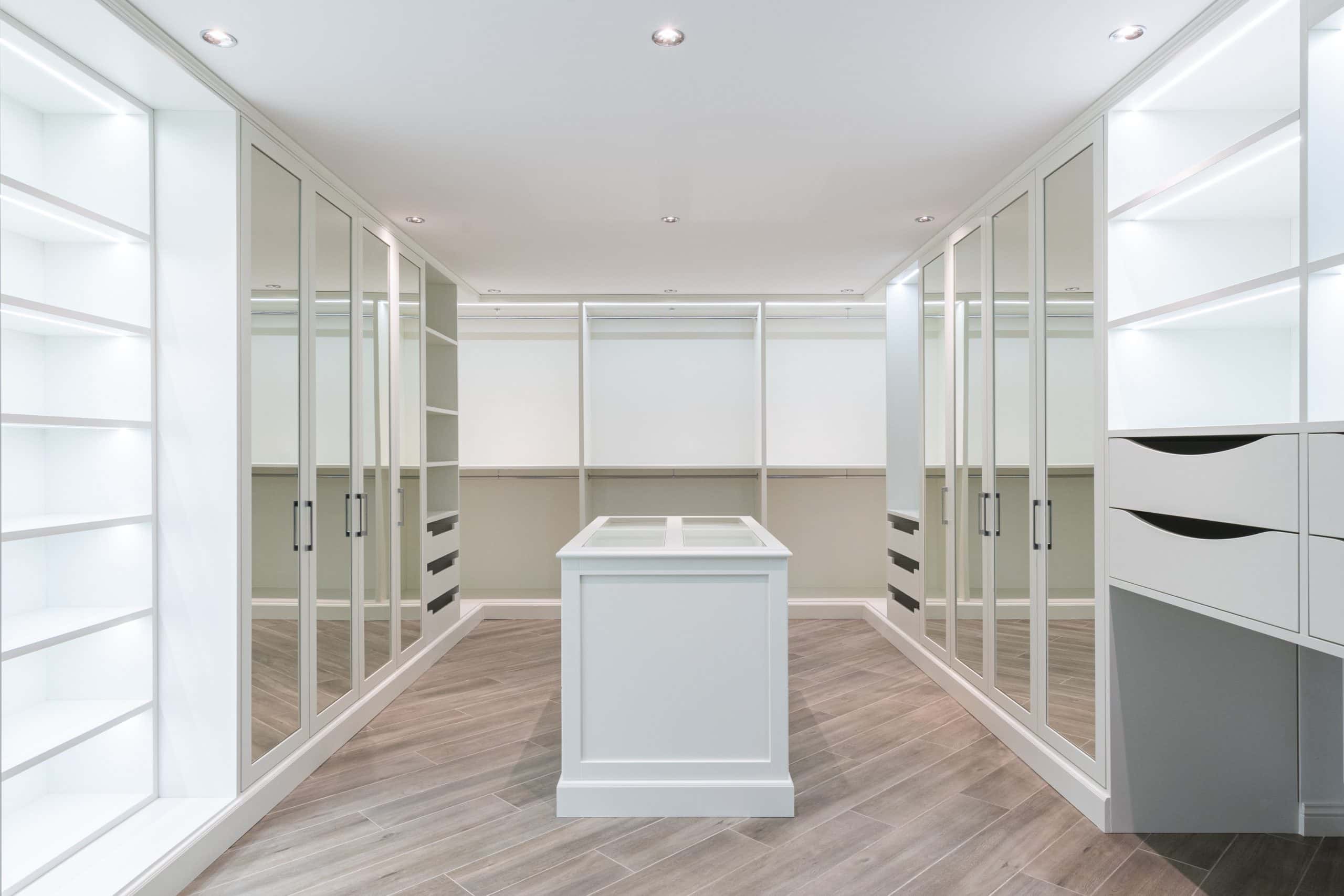 cupboards with glass doors and lights