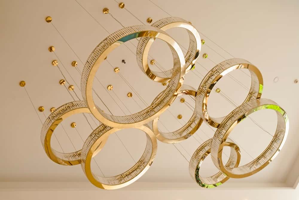 false ceiling with gold chandelier