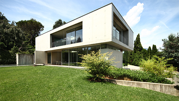Minimal elevation glass designs with corner glazing and garden-facing glass walls