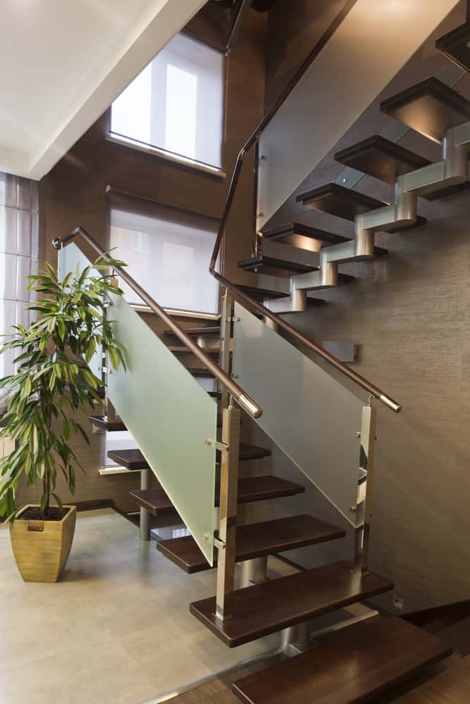 Stylish interior glass railing design for floating staircase