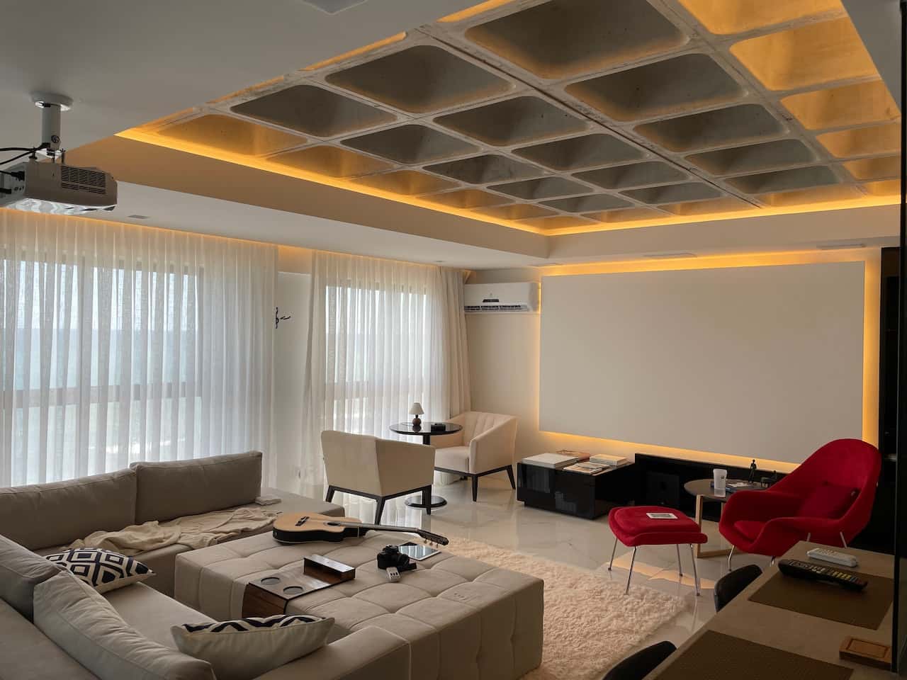 Modern home theatre living room with stylish fiber ceiling designs and lighting