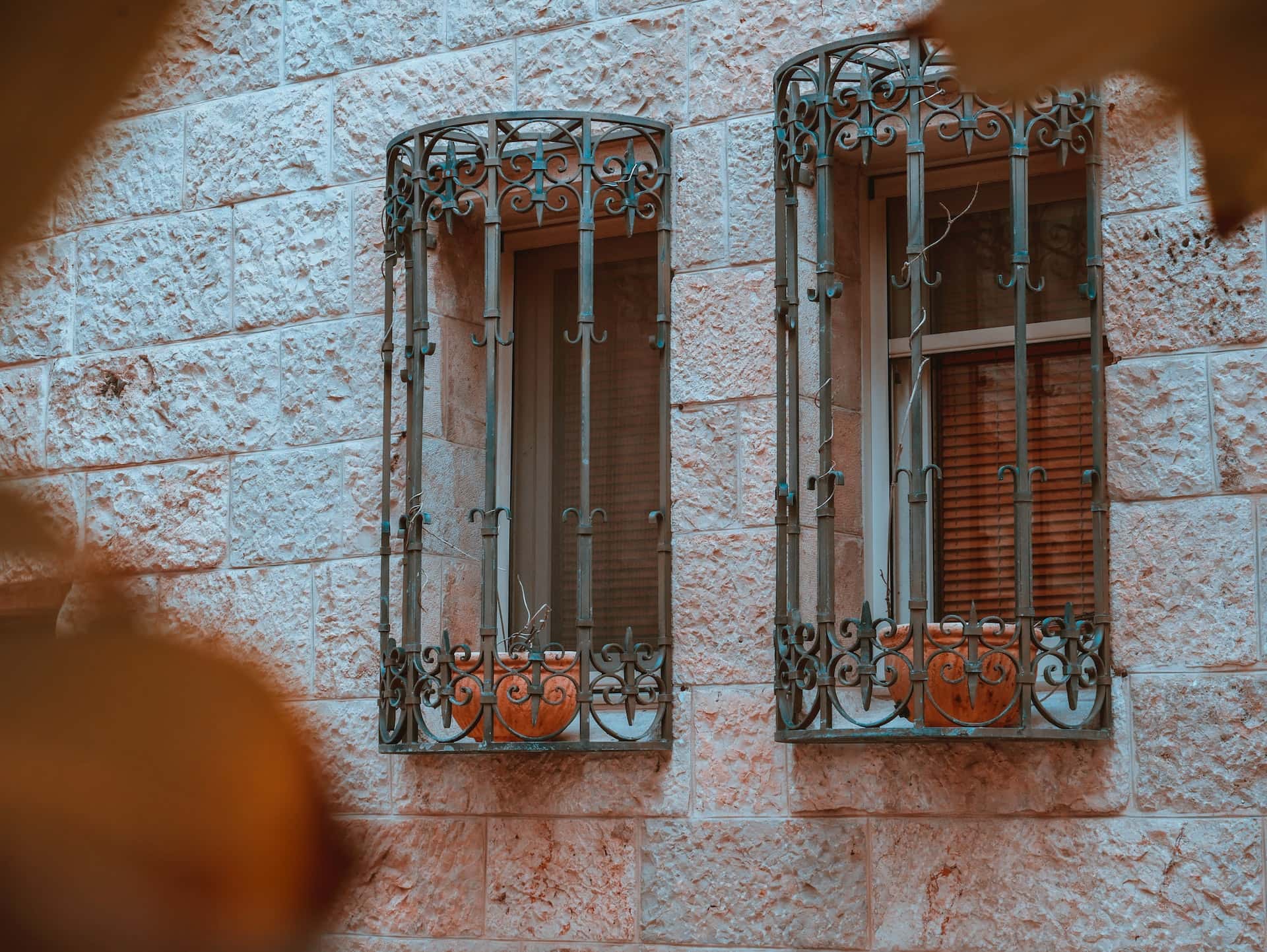 inward-opening windows with grills