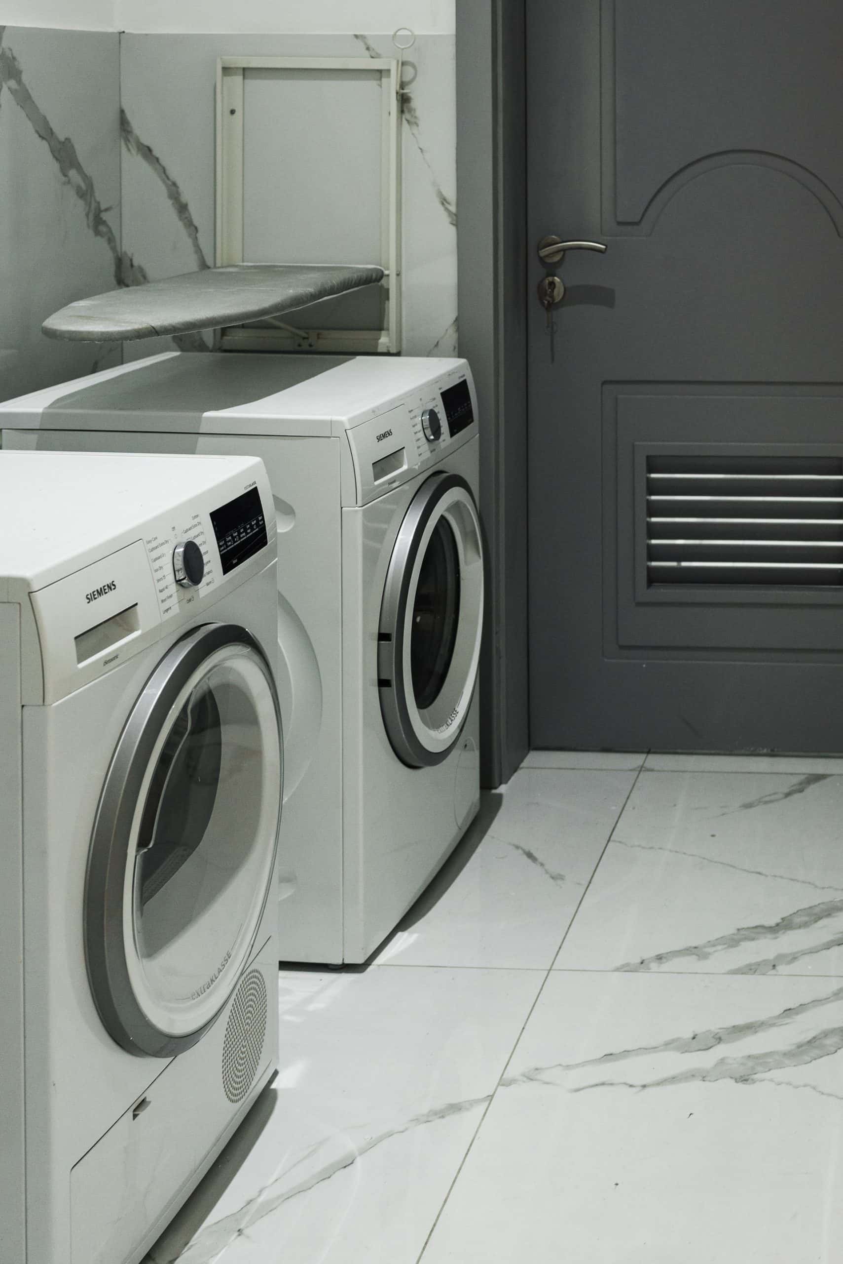 iron board over the washing machine