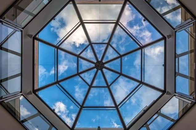 Glass false ceiling design featuring octagon skylight and panoramic sky view