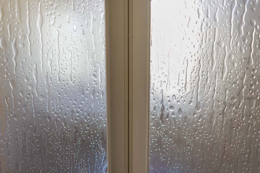 Condensation screen door designs for moisture-prone entry areas