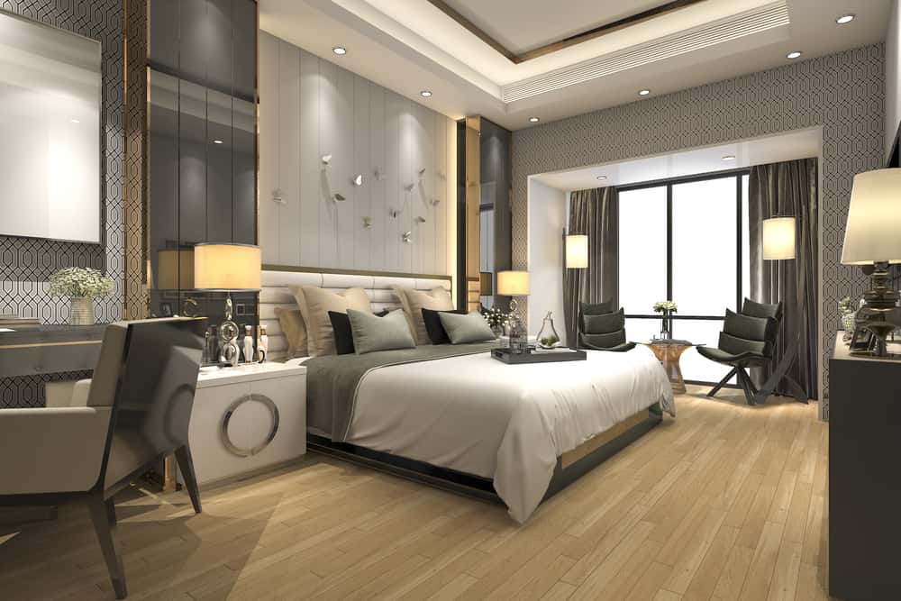 master bedroom with a designated workspace