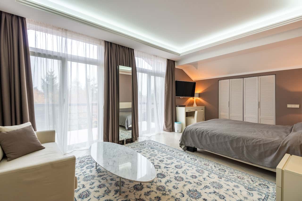 master bedroom with an open walkway