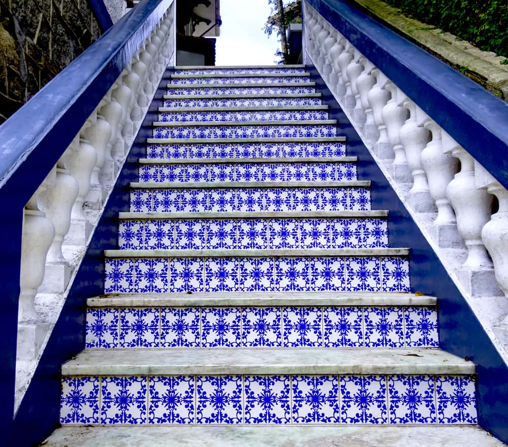 Elegant outdoor staircase tile designs with classic blue and white ceramic patterns