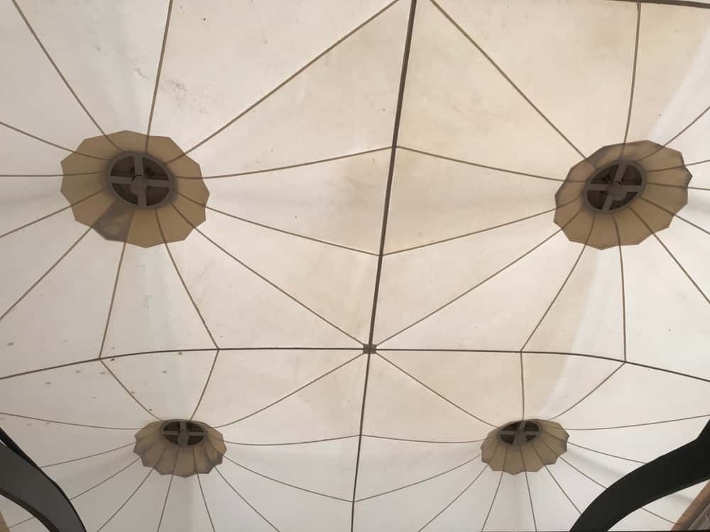 Unique glass ceiling design with geometric dome patterns and central vents