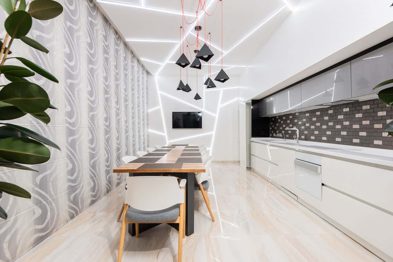 Futuristic dining kitchen with fiber ceiling designs and sleek LED lighting