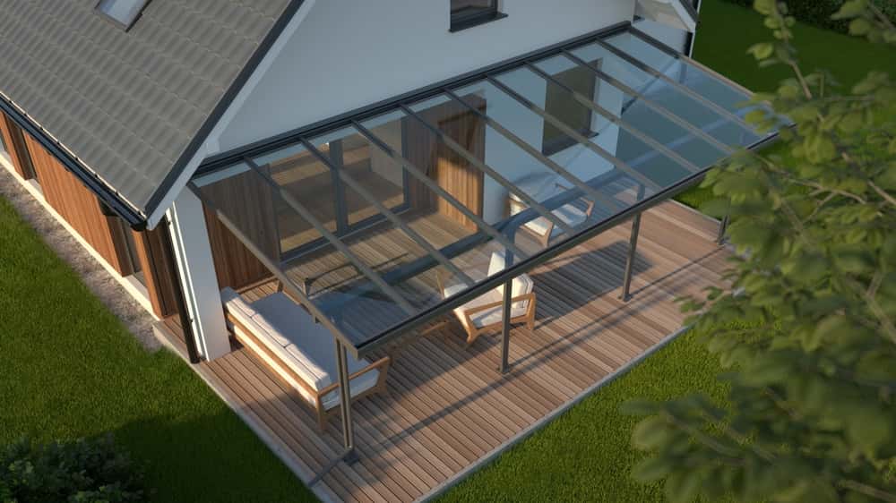 Modern polycarbonate roof design over wooden patio deck with glass wall panels