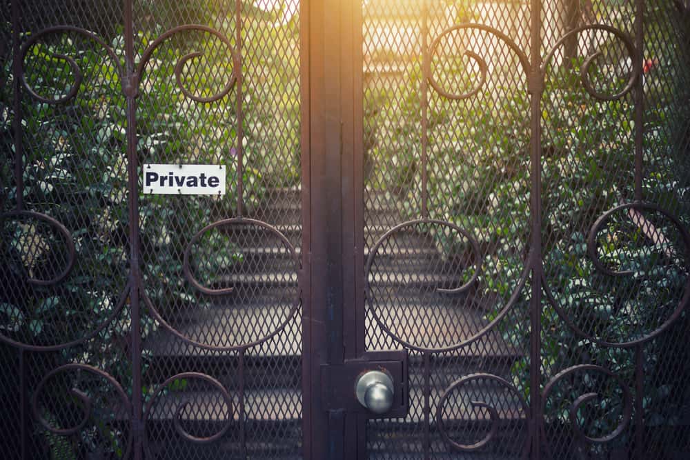 Private stylish screen door designs with ornate iron detailing
