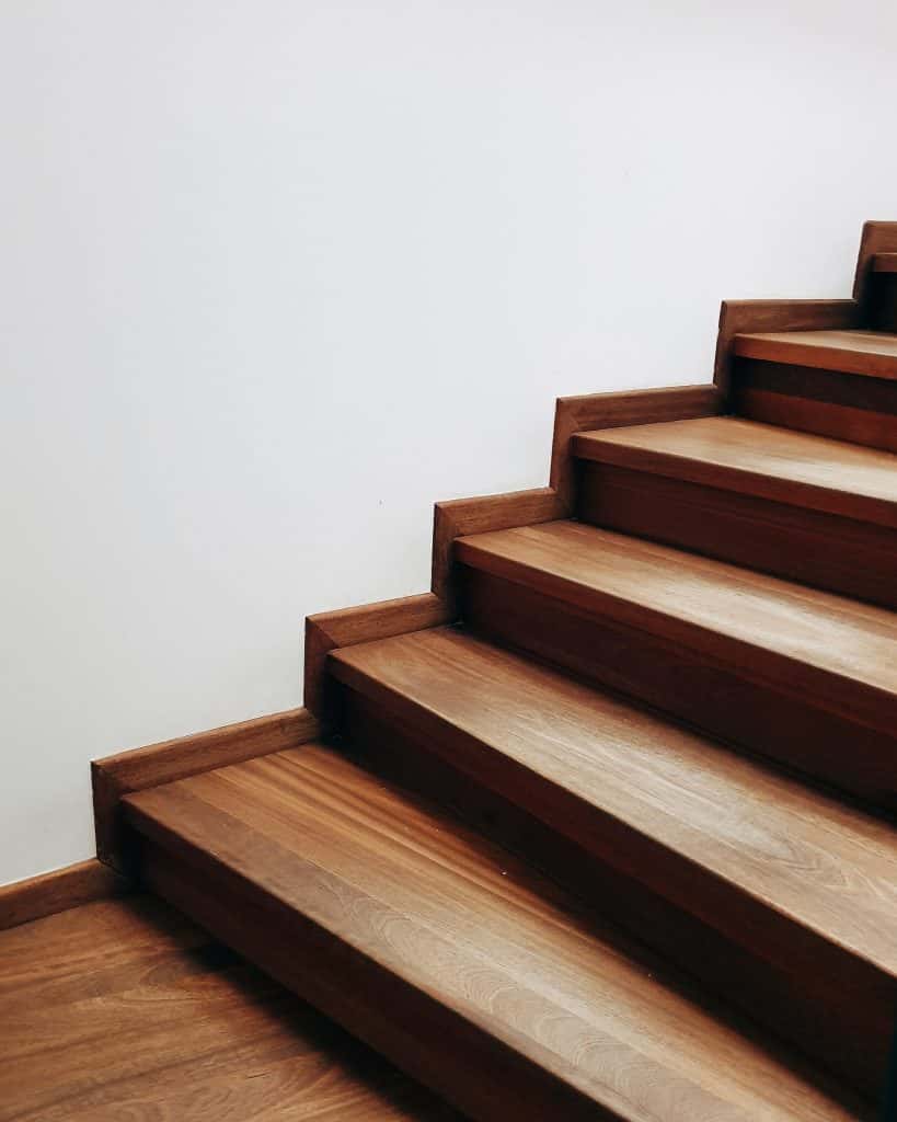 Minimalist wooden staircase tile designs for a clean and natural interior look