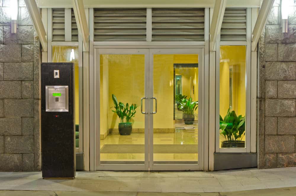 Glass screen door designs with sleek commercial entrance
