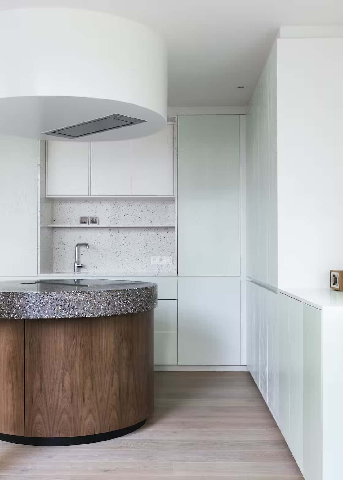 Classic Kitchen Platform Designs round wooden island, white cabinets, contemporary design.