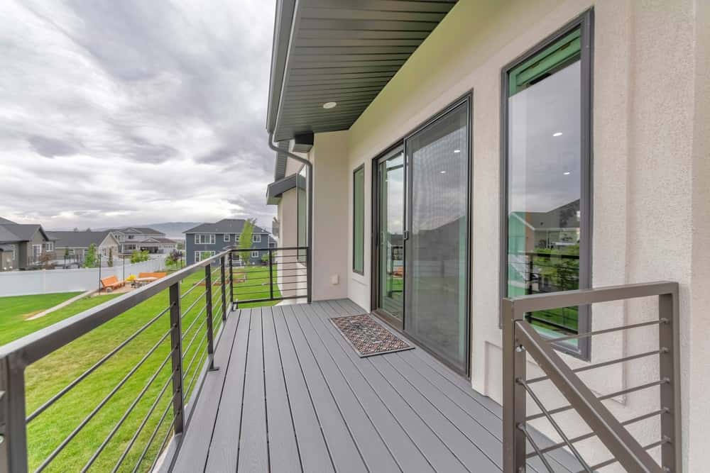Balcony Screen Door Designs in a clean-lined suburban setting