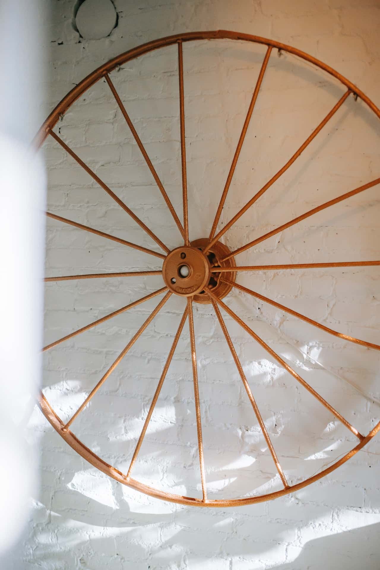 vintage wheel on wall