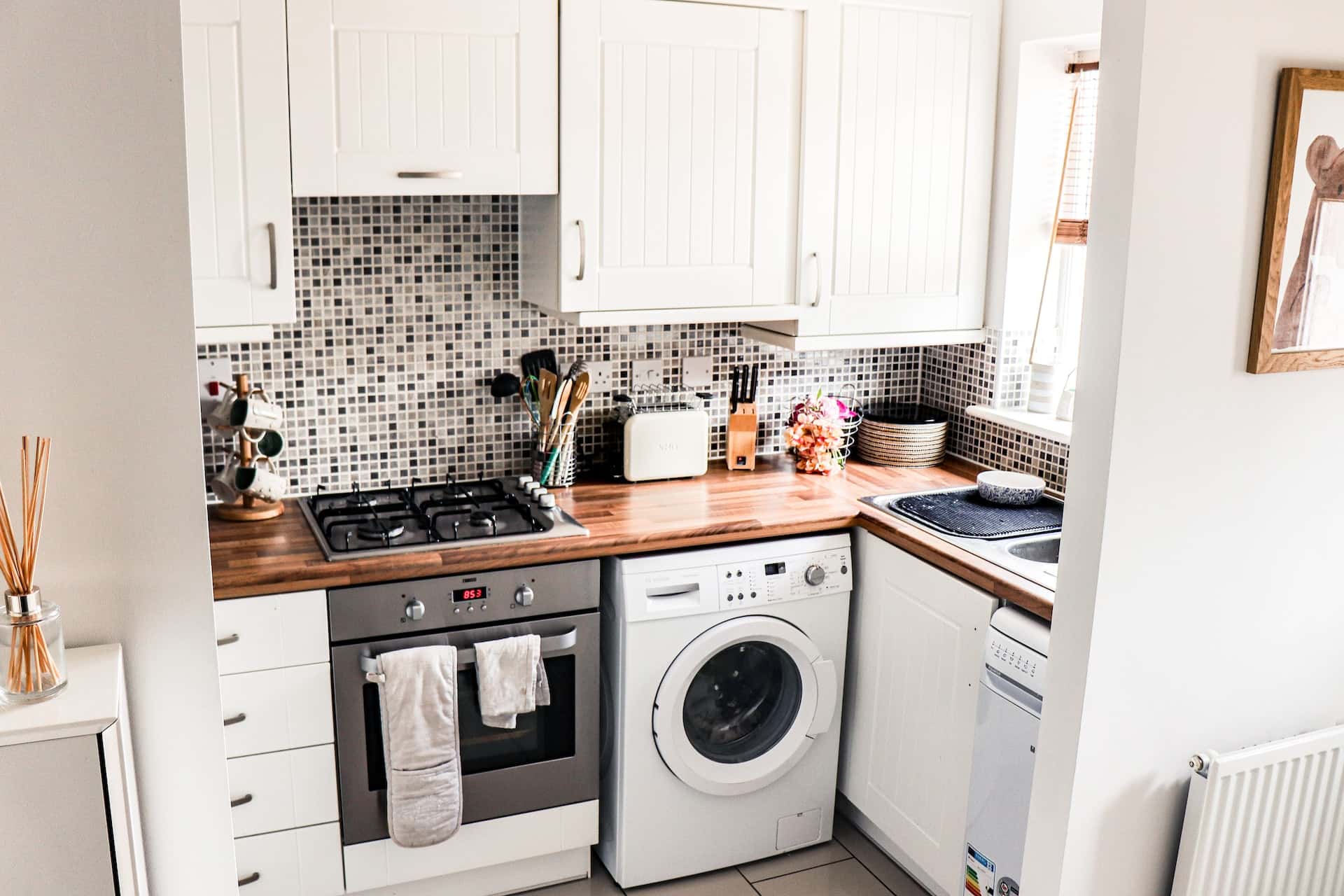 washing machine within kitchen wash area