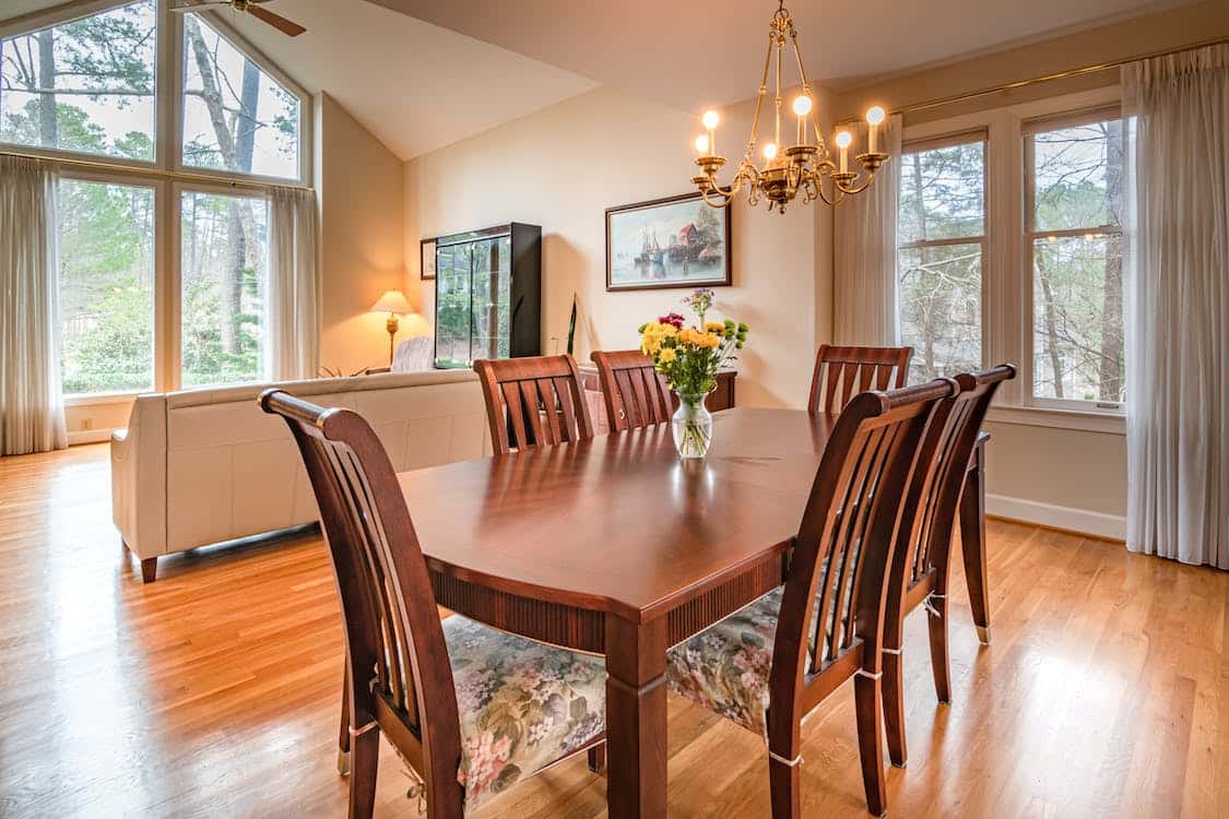 wooden dining table with carved edges