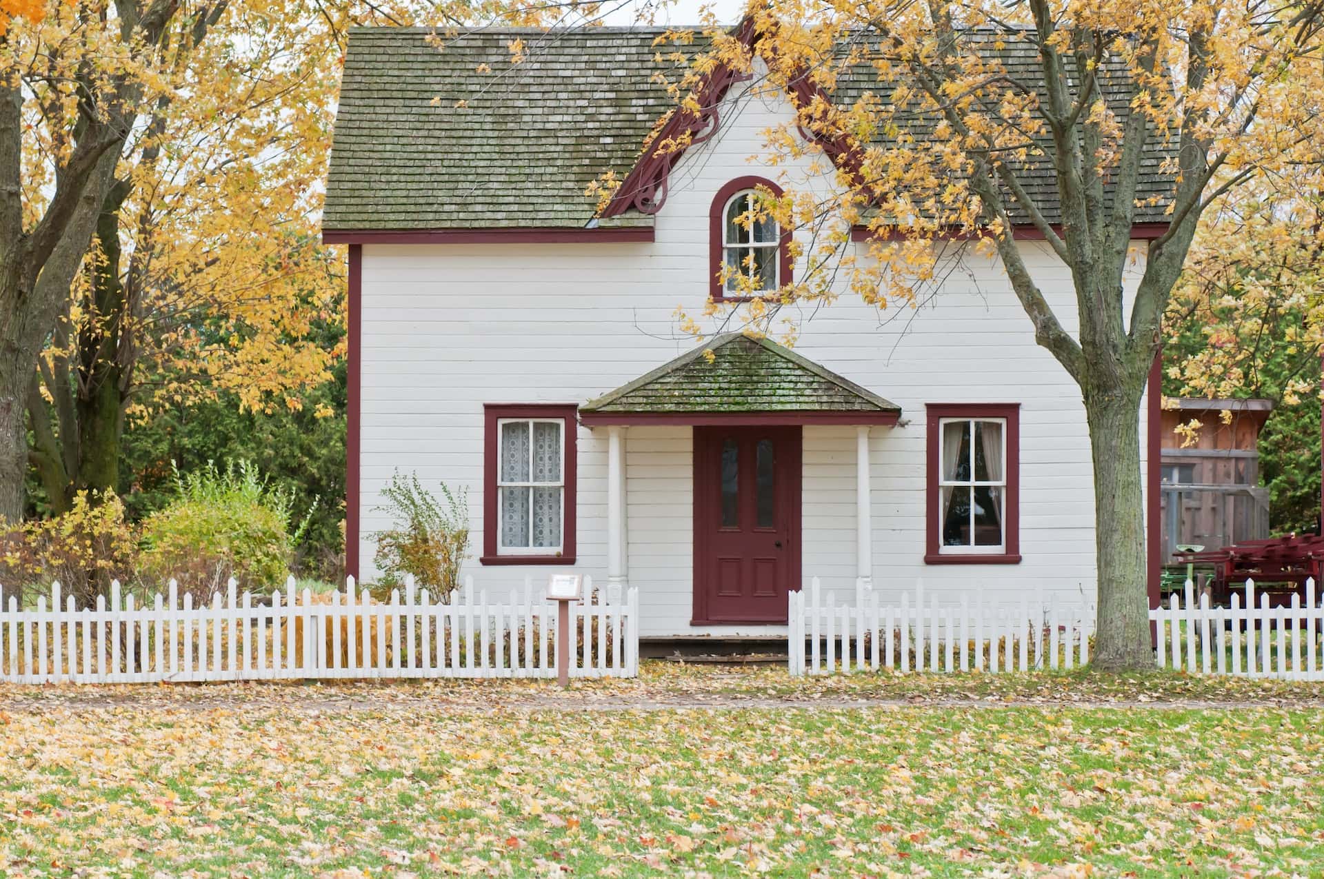 Classic assam type house front design with white walls and gabled roof