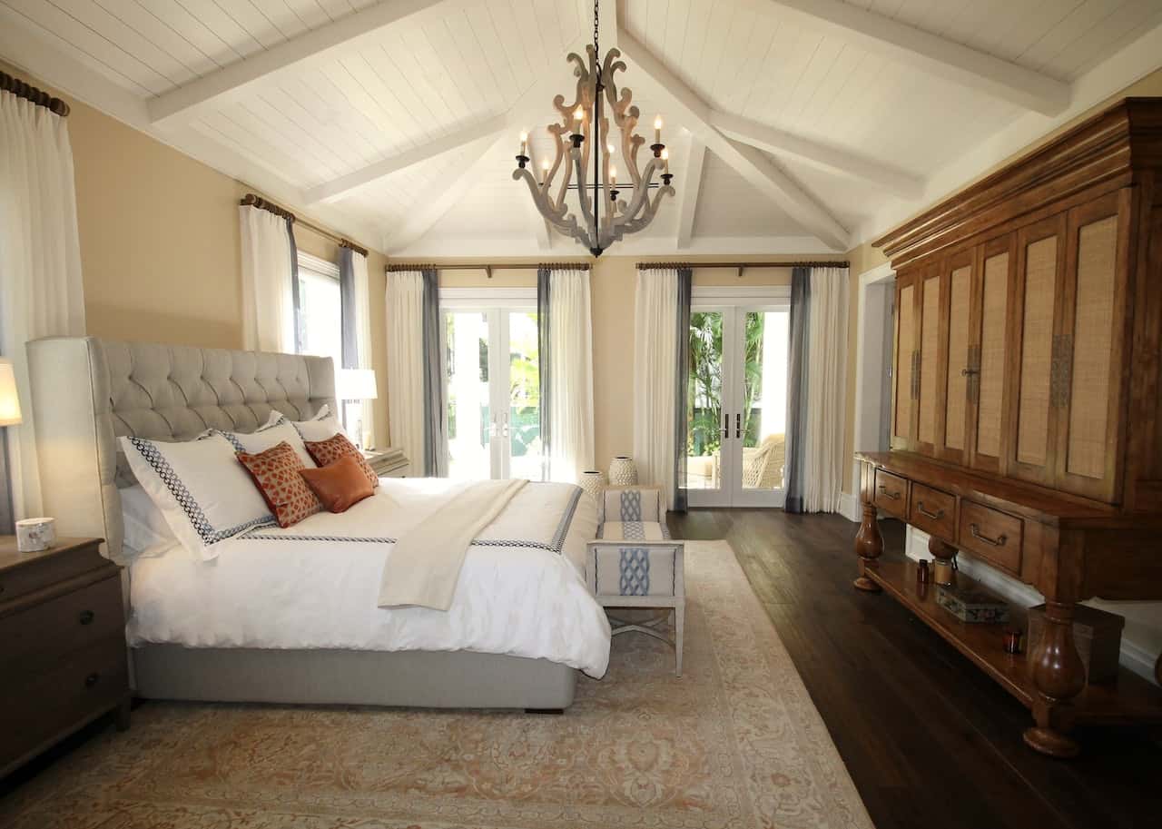 Spacious assam type house room design with vaulted ceiling and wood accents