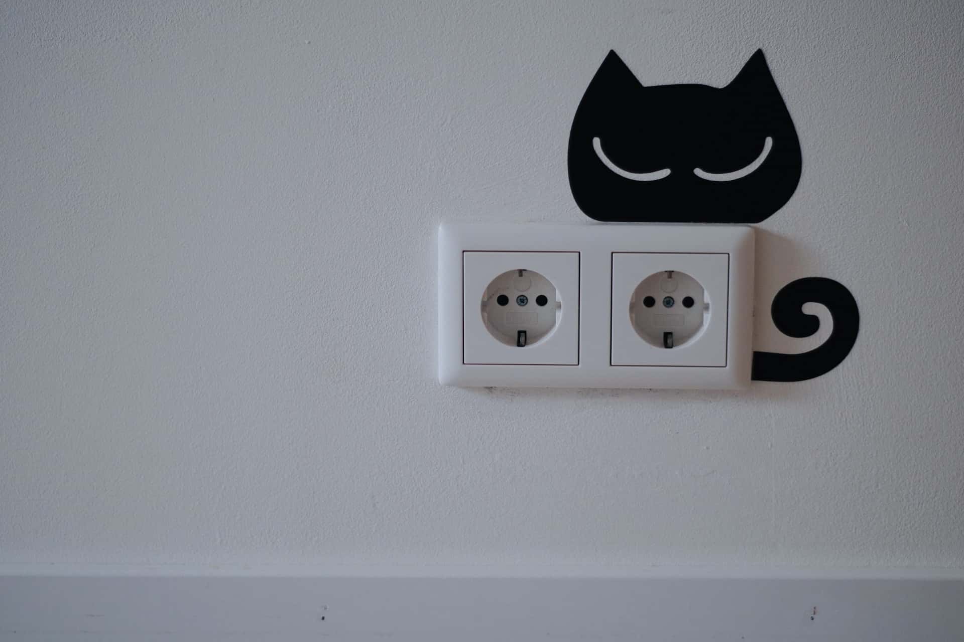 Creative decor around electrical points in bedroom for a fun and safe design touch