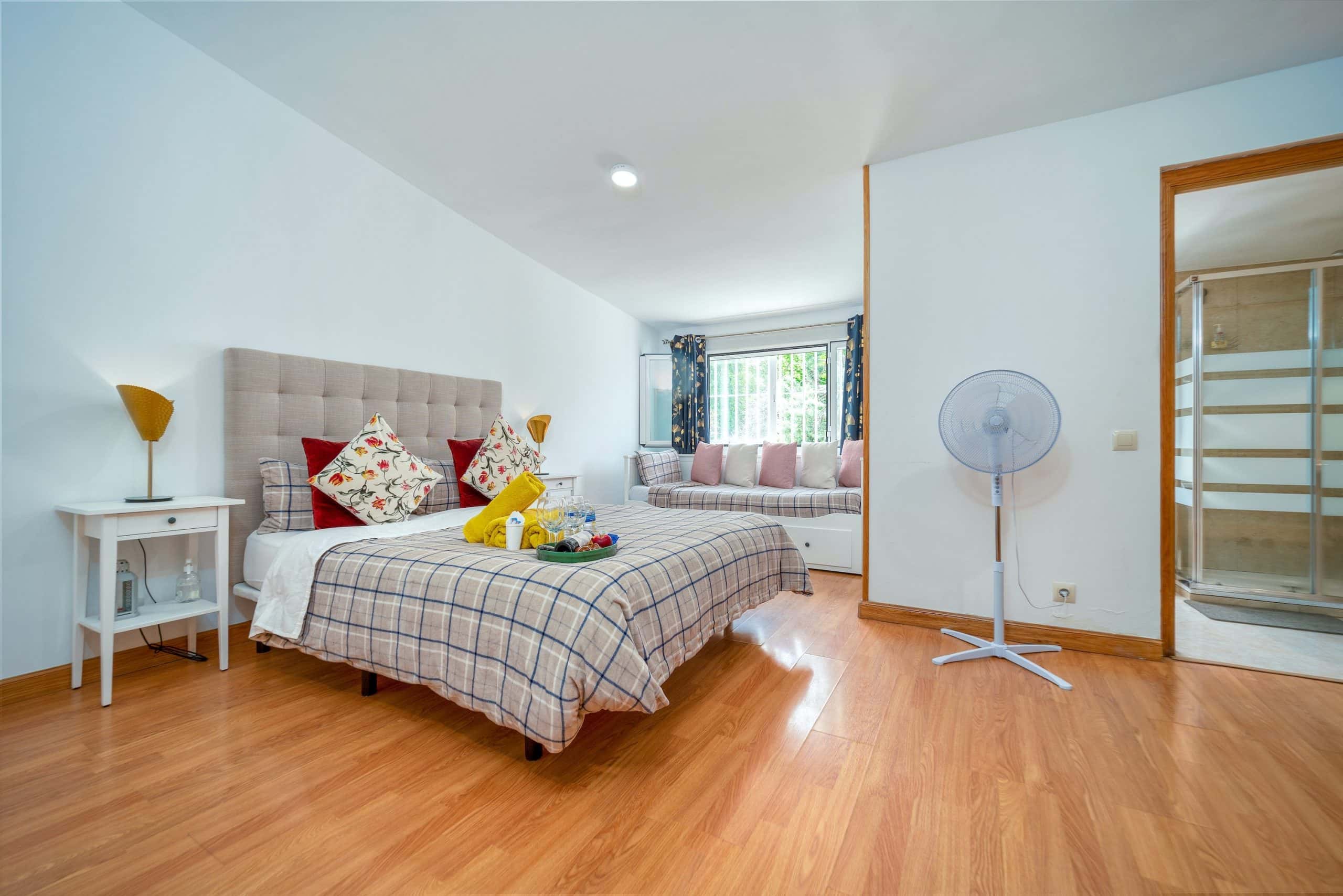 Cozy setup with thoughtful electrical points in bedroom for daily essentials use