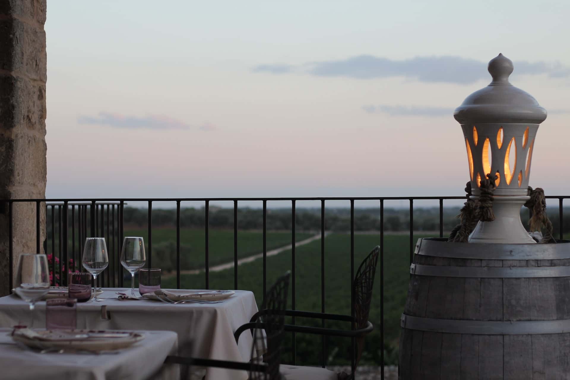 Balcony kitchen ideas with elegant sunset dining table setting