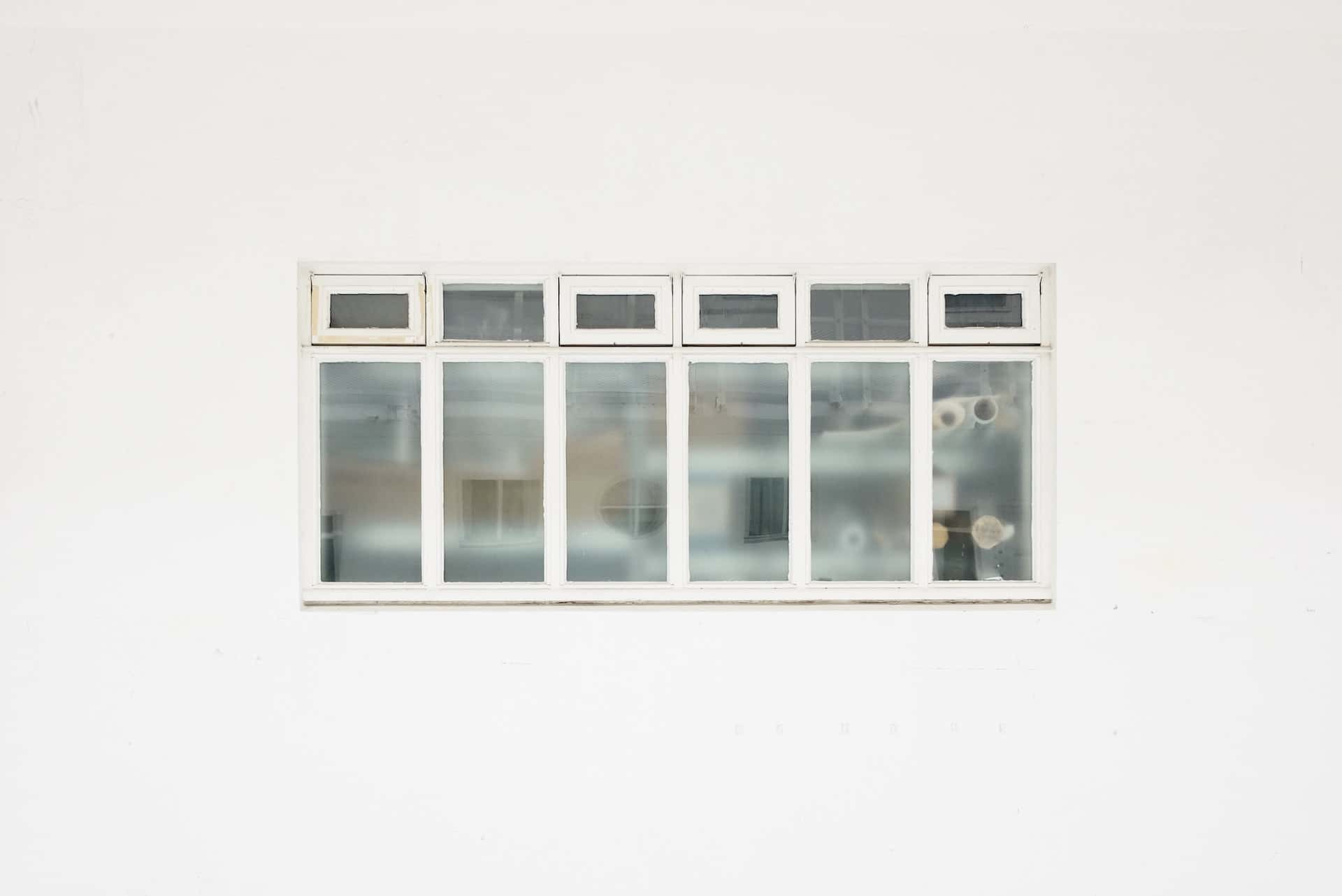 Simple etched glass design for windows that offers privacy with a clean modern look