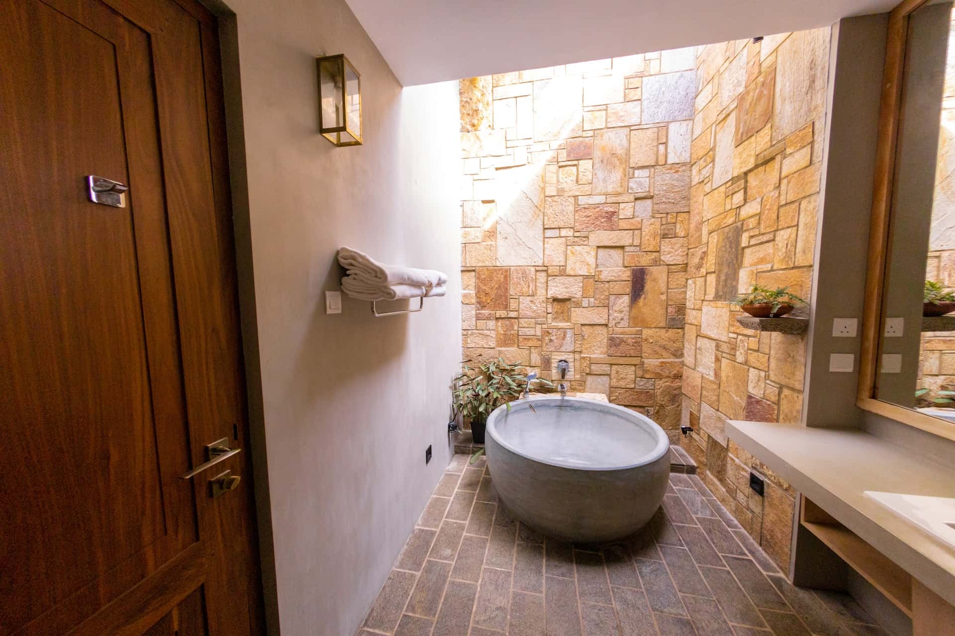 round bathtub in open bathroom