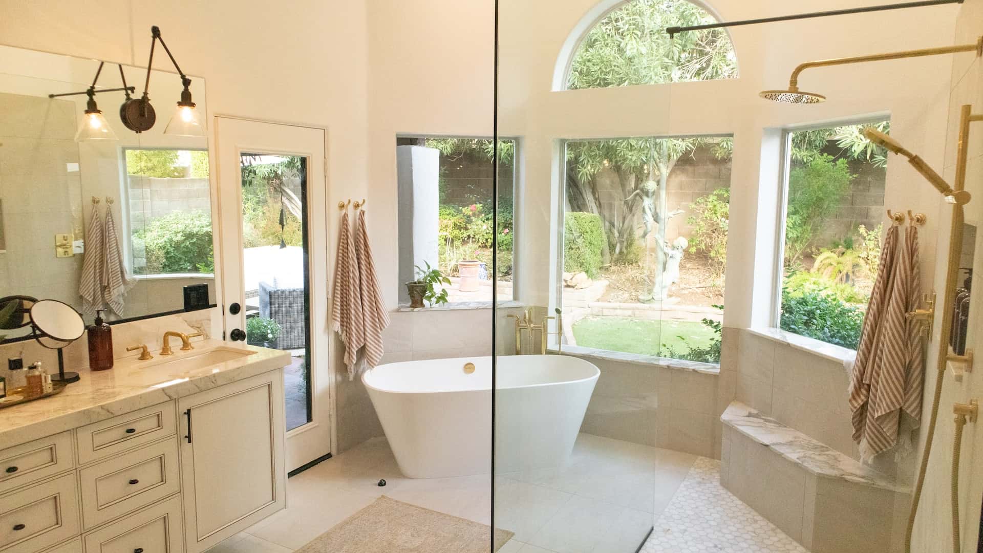semi-open bathroom with multiple windows