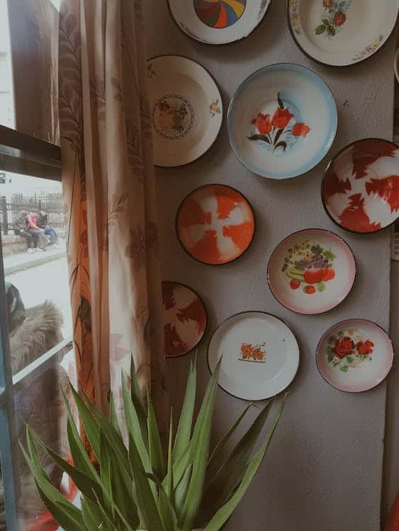 hanging artistic plates on the wall