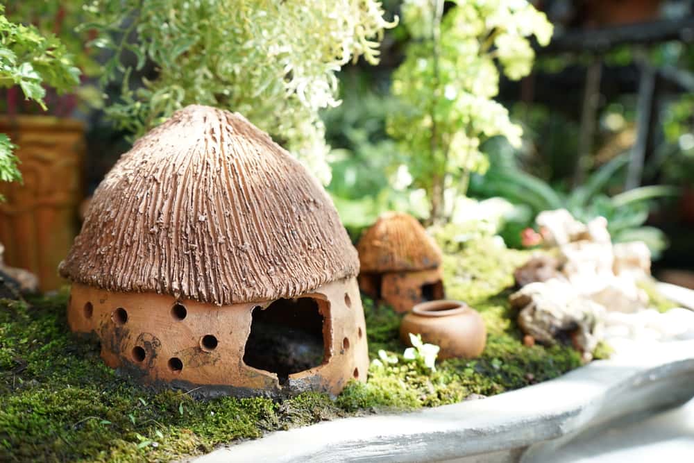 mini garden design with village theme