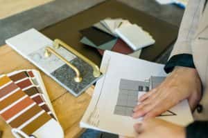 Designer Woman Choosing Details for New Kitchen