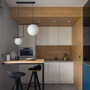 Stylish low cost modular kitchen designs with wood accents and pendant lights