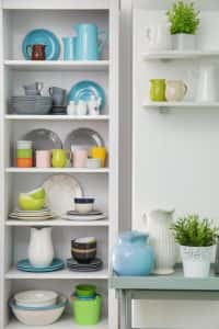 Colorful simple kitchen designs with open shelves and neatly arranged crockery