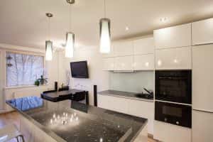 Stylish flat bright kitchen dark table