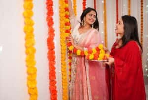 Indian Girls Decorating Their Home