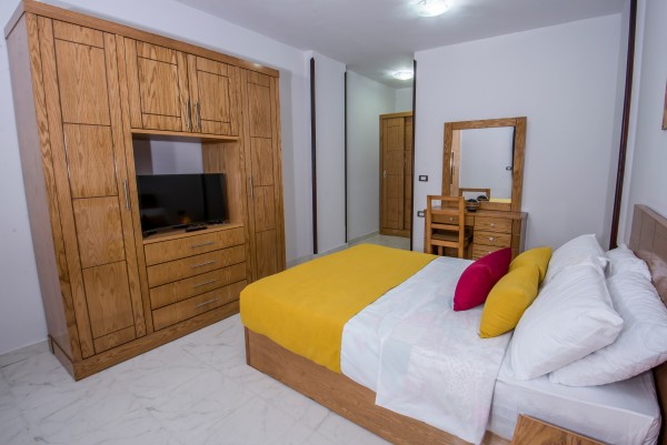 Bedroom wardrobe with a TV unit