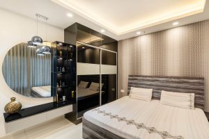 Custom bedroom interiors demonstrating neutral bedroom color schemes by HomeLane