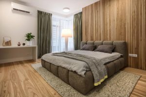 Types of wall panelling materials in modern wooden bedroom design 
