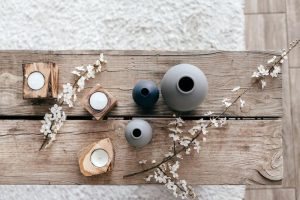 Budget friendly interior designers Bangalore rustic decor candles vases flowers