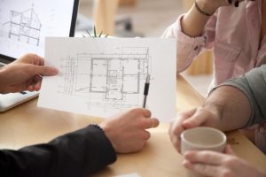 Affordable interior designers Bangalore discussing home layout budget friendly solutions